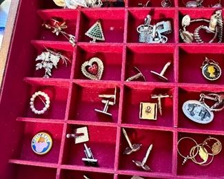Cufflinks & pins.