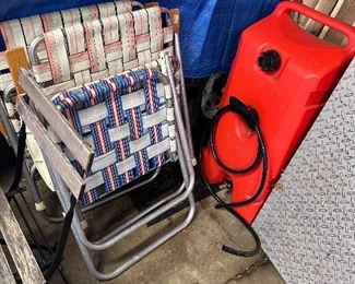 Patio chairs and portable gas tank.
