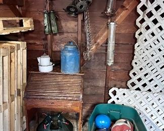 Another child's rolltop desk, balls of all kinds, Halloween yard decorations & bird feeders.