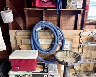 Concrete 2 piece bird bath, stadium seats and coolers.