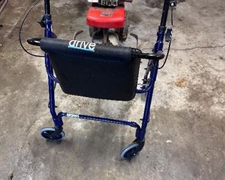 Drive walker with seat.