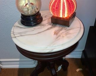 reproduction Victorian table with UT snow globe and a cool lamp
