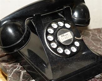 We have several vintage rotary desk phones, in all different colors throughout the house. 