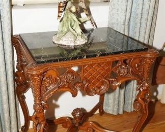 Marble topped side table in the French manner with cherub cabriolet legs-look closely-cool, huh? circa 1920