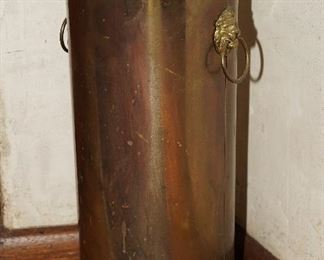 Vintage brass umbrella stand with lion head handles
