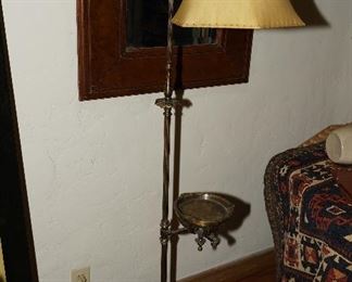 Anyone need an antique  cylindrical brass smoking table floor lamp with a rawhide shade and a green marble base?  Very Cool!