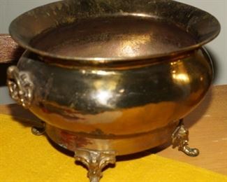 Large copper footed cauldron with lion handles