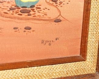 B. Yazz signature on bottom right 