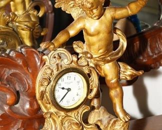 Gold gilt New Haven footed cherub mantle clock