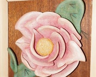 Pink rose in wood.