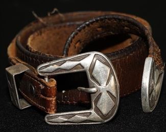 Old pawn belt buckle with leather belt