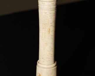Antique carved bone candle holder