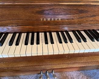 Yamaha piano keeps were kept covered with felt and the top down excellent shape and we have a number for a piano mover
