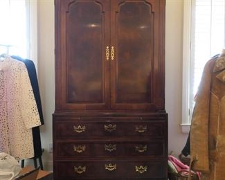 Mahogany entertainment center with storage drawers