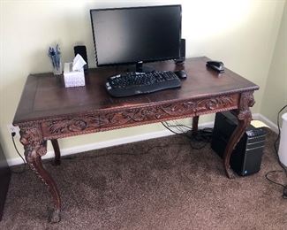 carved leg desk with Lions 56" X 28" - the computer monitor & keyboard is for sale 