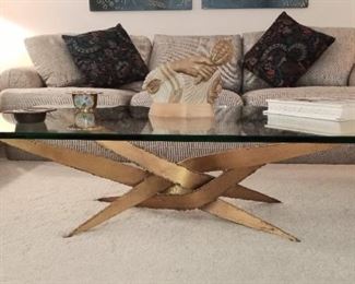 Heavy glass top coffee table in pristine condition