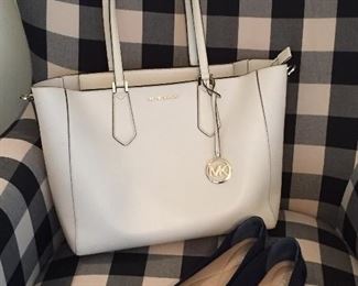 Michael Kors purse with matching wallet.