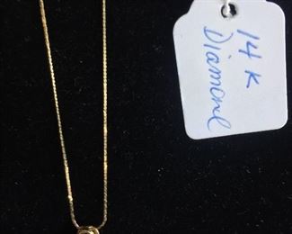 14 K Gold and Diamond.