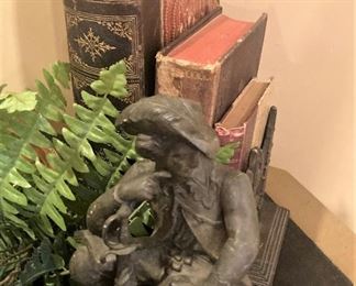 Old books; statue