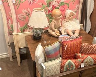 Vintage beds and antique dolls  .  .  . these twin headboards were custom made for Jane Whitney when she was a young girl.