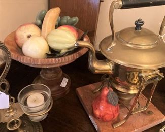 Stone compote and stone fruit; brass tea pot