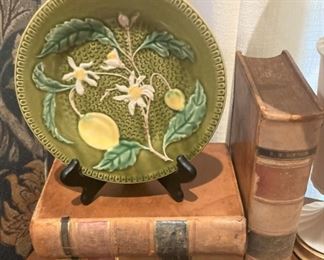 Majolica plate; old books