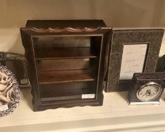 Small display case; small clocks