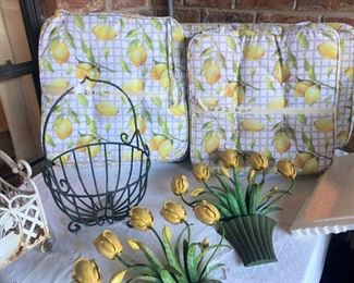 Enamel wall décor; lemon cushions