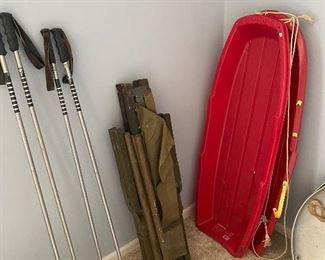 vintage army cot and ski poles