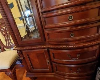 Nice Cherry China cabinet with drawer storage. glass on one side has crack 