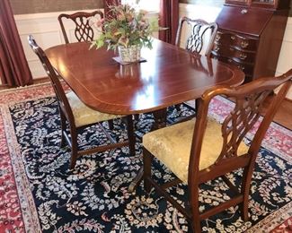 dining table with 6 chairs. Measures: 9 feet long (with two leaves inserted which are 19 3/4" wide) x 45" wide