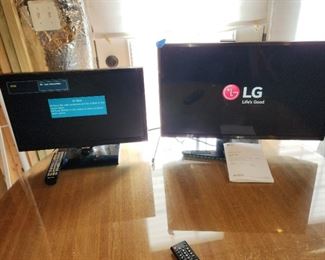 Samsung and LG flat screen TVS, both work perfectly, both on stands with remotes