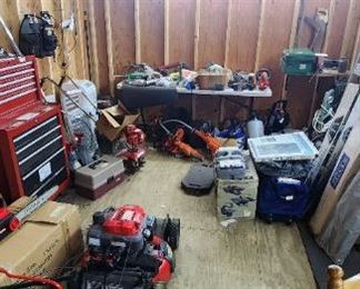 craftsman jig saw table screen houses all kinds of garden equipment , Electric weed eaters, Coleman camp stove , Colman gas lantern, electric quartz heater 