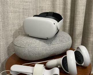 Meta Quest 2, two touch controllers, head strap, and carrying case