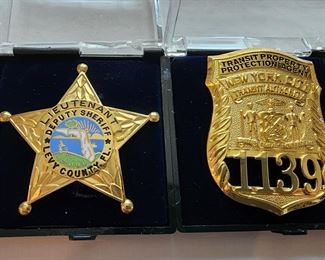 Left: Levy County FL Deputy Sheriff Lieutenant badge. Right: New York City Transportation Authority Transit Property Protection Agent.