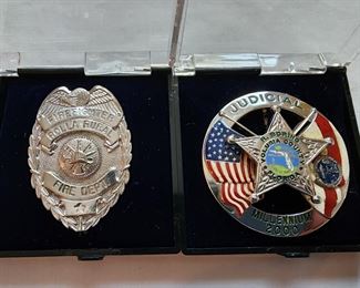 Left: Rolla MO Rural Fire Department badge. Right: Volusia County FL Judicial Millennial badge.
