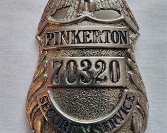 Pinkerton Security Service badge.