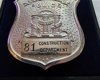 Atlanta Police Construction Department badge.