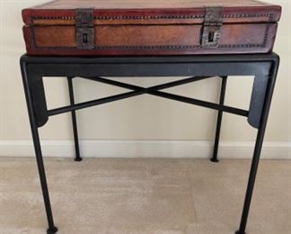 $500.00………..IRON BASE LEATHER WRAPPED SUITCASE TABLE