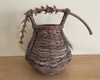 $200.00………..SAMUEL YAO HAND WOVEN BASKET ART 20” TALL