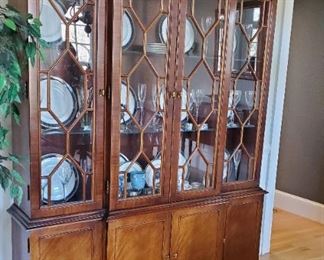 Hickory Mahogany Glass Breakfront cabinet with silver drawer. Contents are not in the sale.
