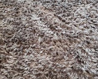 Deep grey room size shag carpet