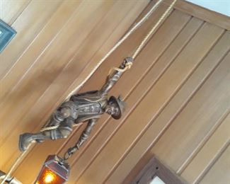 German carved figural pendant light