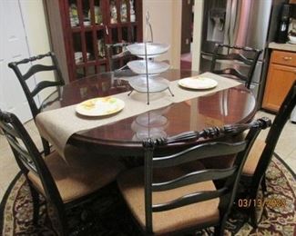 Different view - Round dining table.  Glass top not included.