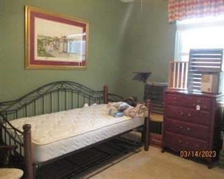 Black metal & wood frame Trundle bed.  1 mattress like new.