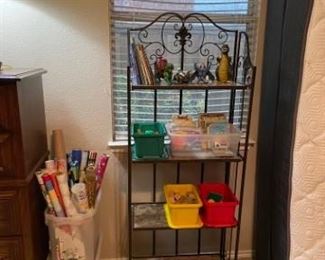 Children's books and toys.  Metal folding rack.