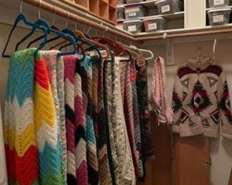 Afghans....lots of them!  Storage containers and shoe storage units. 