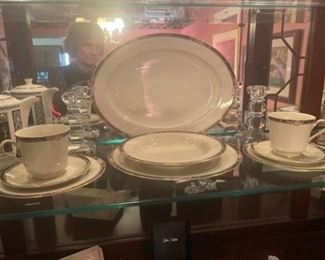 Mikasa Dinnerware.   Many pieces are still in boxes.  Probably service for 12.