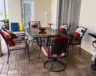 Patio set with six chairs to swivels at 67 x 43