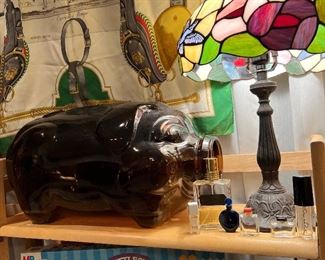 Giant glass pig! Fancy perfume bottles… Hermes, Tiffany, Oscar